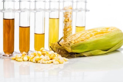 Corn Generated Ethanol Biofuel With Test Tubes On White Backgrou