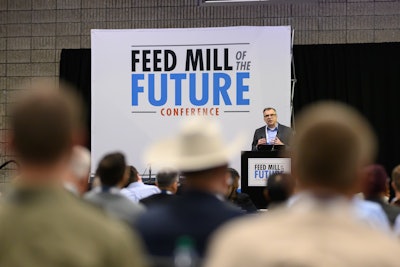 Keynote speaker addressing the audience at the 2024 Feed Mill of the Future Conference.