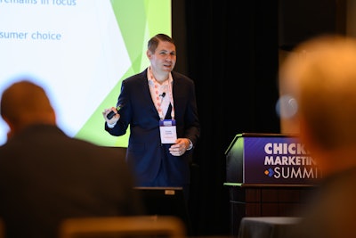 Darling Ingredients director of sustainability Ethan Carter presenting at the 2024 Chicken Marketing Summit.