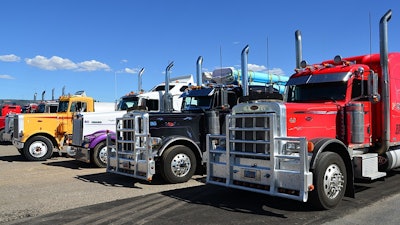 Semi Trucks Parked In Row